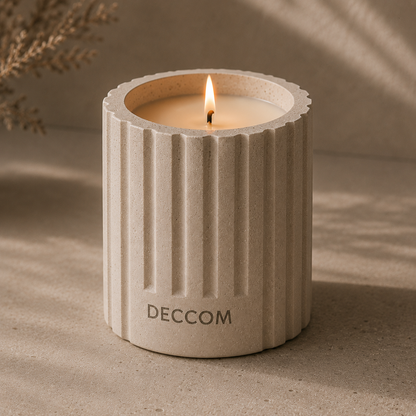 Close-up of DECCOM Column Vessel soy candle showing fluted architectural design and matte stone texture