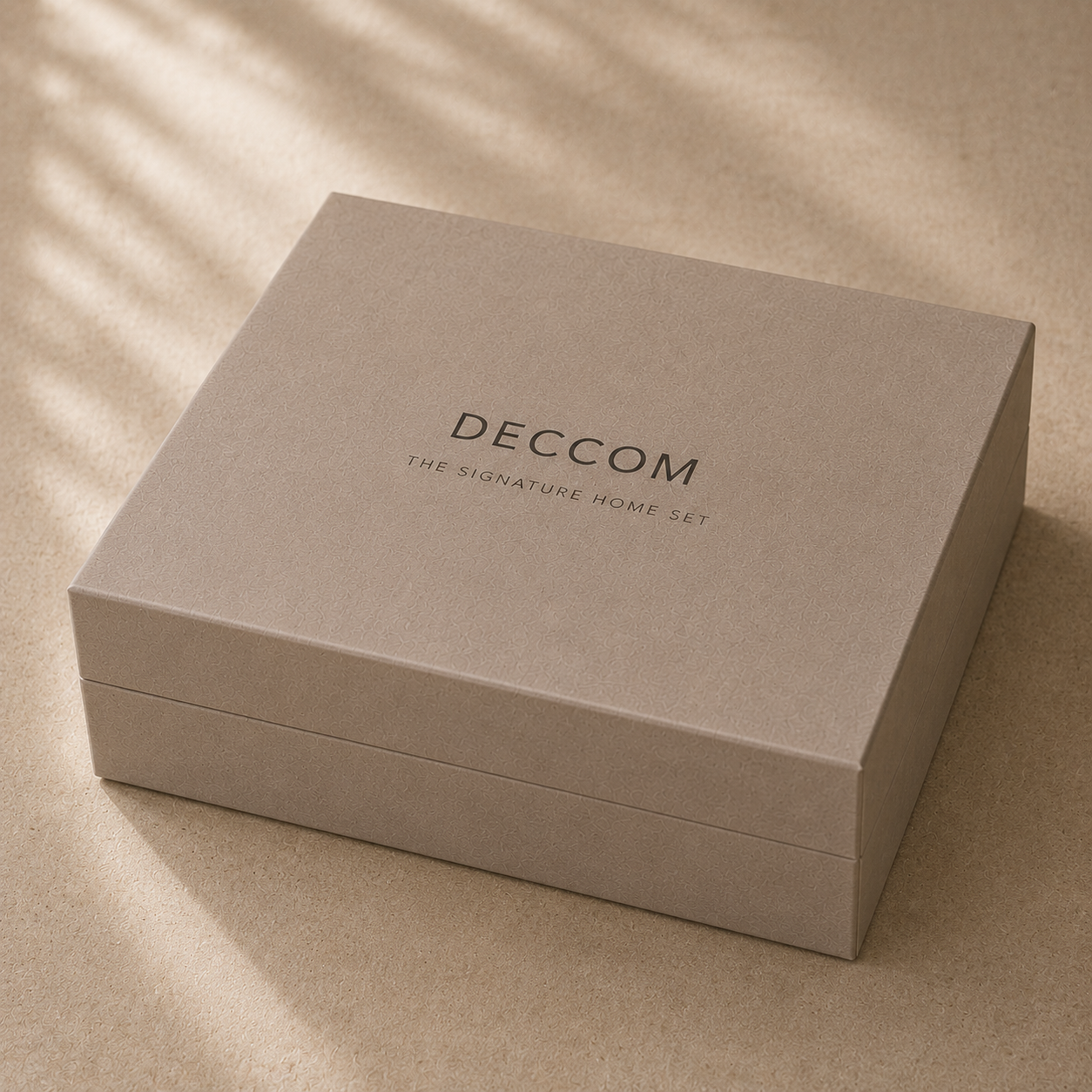 Closed DECCOM Signature Home Set rigid gift box in warm beige finish