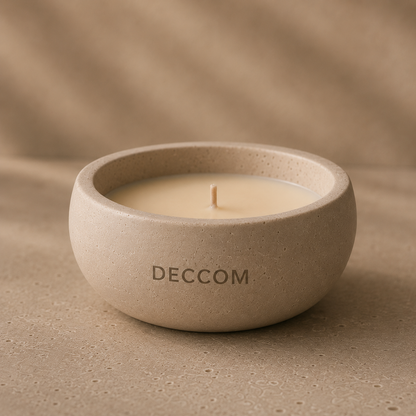 Close-up of DECCOM Quiet Bowl soy candle showing matte stone texture and natural soy wax