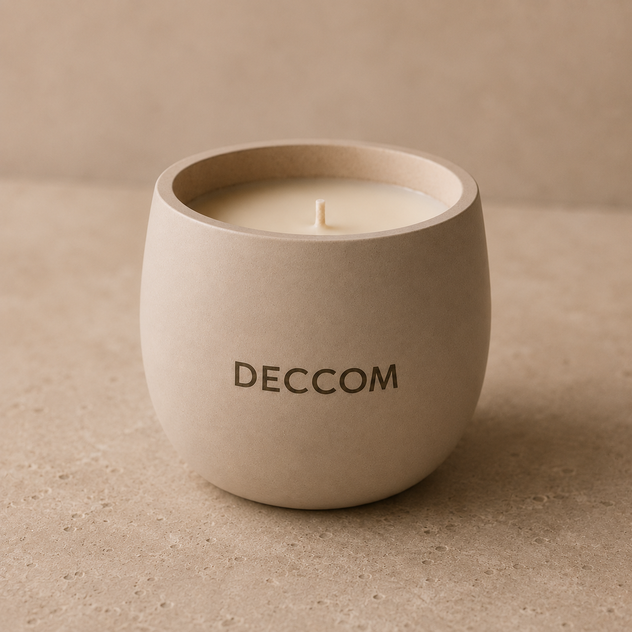 DECCOM Rounded Vessel soy candle in warm stone finish from The Essential Gift Set