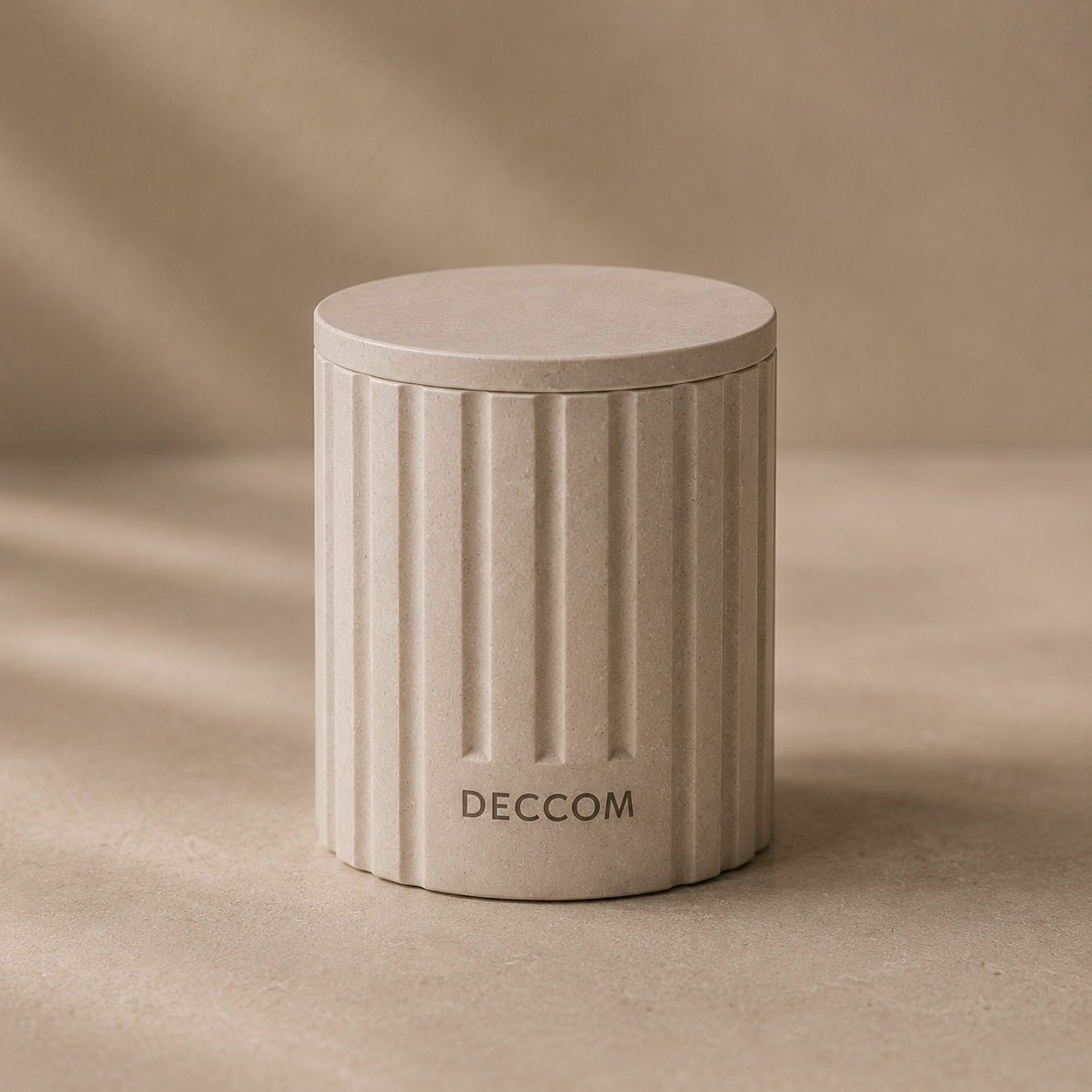 DECCOM Column Vessel with matching stone lid in a clean minimalist product shot
